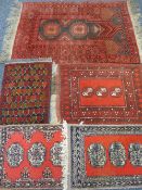 FIVE PERSIAN/MIDDLE EASTERN SCATTER RUGS, all having traditional repeat, all block patterns on red