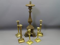 GEORGIAN BRASS CANDLESTICKS, two pairs, a similar age bronze example and a vintage style altar stick