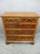TWO REPRODUCTION BURR WALNUT & MAHOGANY EFFECT CHESTS OF DRAWERS both having inlaid star detail to