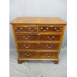 TWO REPRODUCTION BURR WALNUT & MAHOGANY EFFECT CHESTS OF DRAWERS both having inlaid star detail to