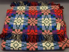 TREGWYNT WELSH WOOLLEN BLANKET in traditional, reversible block pattern in green, pink, reds and