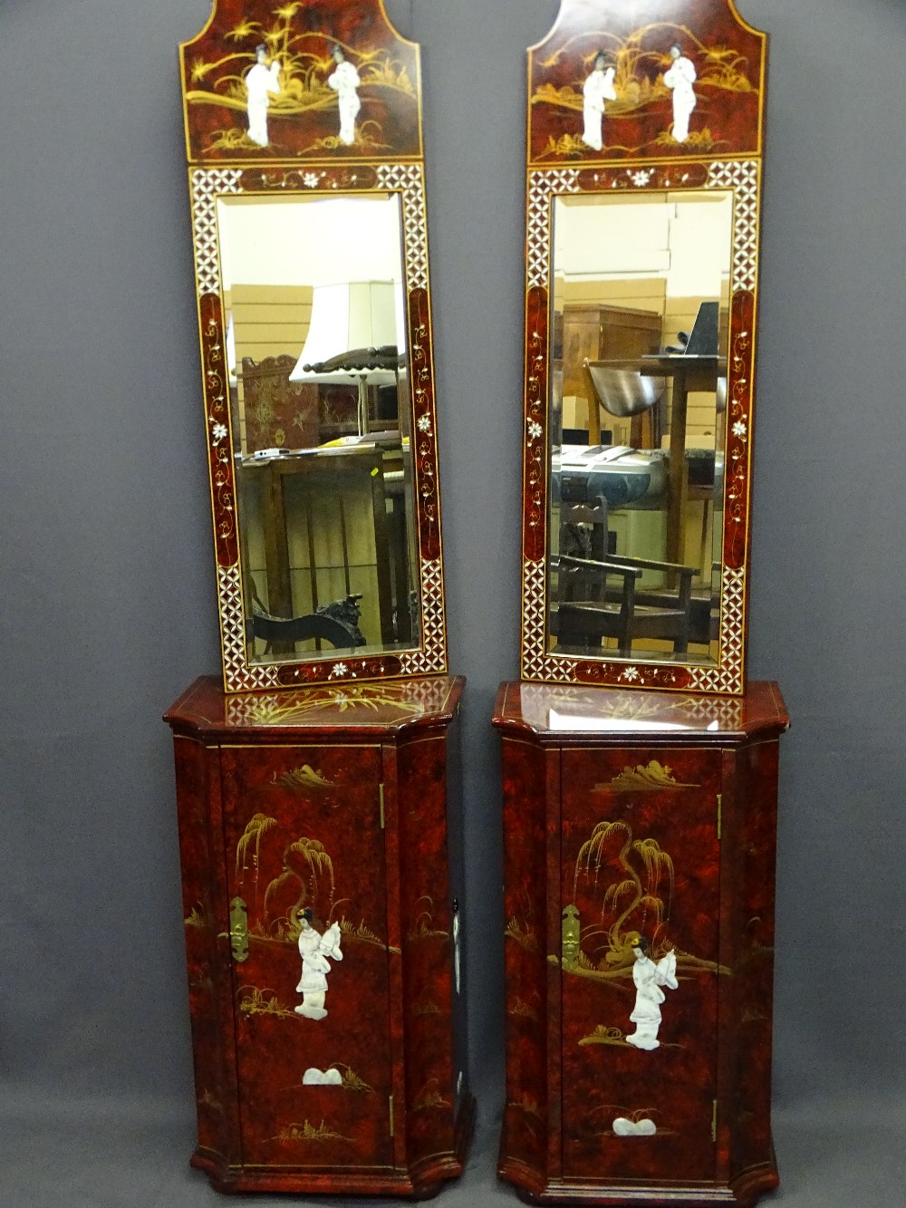 JAPANESE RED SIMULATED LACQUER WORK, single door cabinet and mirror ensembles, a pair, the cabinet