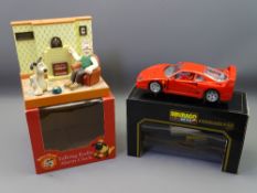 BURAGO DIECAST FERRARI F40 and a Wallace and Gromit talking radio collectable alarm clock, both in