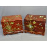 TWO JAPANESE SIMULATED RED LACQUER WORK CHESTS, a pair, lift-up lids with brass clasps and lined