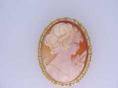 LARGE 9CT GOLD SHELL CARVED CAMEO BROOCH with safety chain of a young woman in profile, 16.5grms