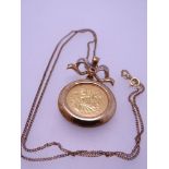 ROYAL MINT 'ETERNAL LOVE' PENDANT, 2005 half sovereign necklace, 9ct gold mounted with fine link