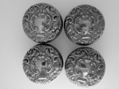 EMBOSSED LID, FOUR CIRCULAR SILVER PILL BOXES with gilt interiors, Birmingham hallmarks, late 20th