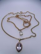 TWO 9CT GOLD PENDANT NECKLACES to include a flat link example with semi-precious facet cut stone