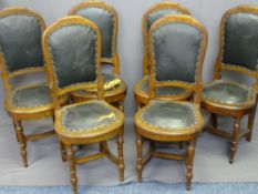 SET OF SIX VICTORIAN OAK DINING CHAIRS having horseshoe shaped seats on turned front supports with