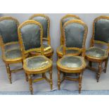 SET OF SIX VICTORIAN OAK DINING CHAIRS having horseshoe shaped seats on turned front supports with