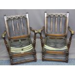 PRIORY STYLE CARVED OAK EASY CHAIRS with loose cushion tapestry type upholstery, 80cms H, 70cms W,