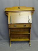 ARTS & CRAFTS STYLE OAK BUREAU BOOKCASE having a railed top with carved applied corbels, stylized