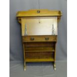 ARTS & CRAFTS STYLE OAK BUREAU BOOKCASE having a railed top with carved applied corbels, stylized