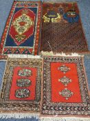 FOUR MIDDLE EASTERN/PERSIAN SCATTER RUGS including a colourful example with central block pattern