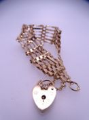 9CT GOLD GATE LINK BRACELET with padlock clasp, 13grms gross