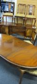 CROSSBANDED MAHOGANY DINING SUITE of sideboard, extending dining table and eight chairs, the