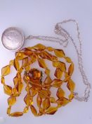 TWO VINTAGE NECKLACES including a George V 1926 half-crown in a white metal mount and necklace chain