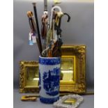 CHINESE STYLE BLUE & WHITE POTTERY STICK STAND & CONTENTS including a silver topped walking cane,