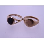 TWO 9CT GOLD SIGNET RINGS, 5grms gross, one having heart cut outs to the shoulders, the top inset