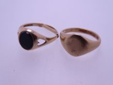 TWO 9CT GOLD SIGNET RINGS, 5grms gross, one having heart cut outs to the shoulders, the top inset