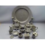 PEWTER CHARGER, pair of candlesticks and other pewter tableware, 55.5cms diameter, London touch