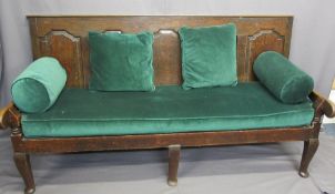 ANTIQUE OAK OPEN ARM BENCH having five shaped panel back with upholstered loose seat pad and pad
