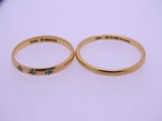 22CT GOLD WEDDING BAND & ONE OTHER set with three tiny emeralds, 5grms gross, size S and N