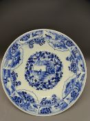 LATE 19TH CENTURY CHINESE EXPORT PORCELAIN CHARGER, blue and white decorated with birds and people