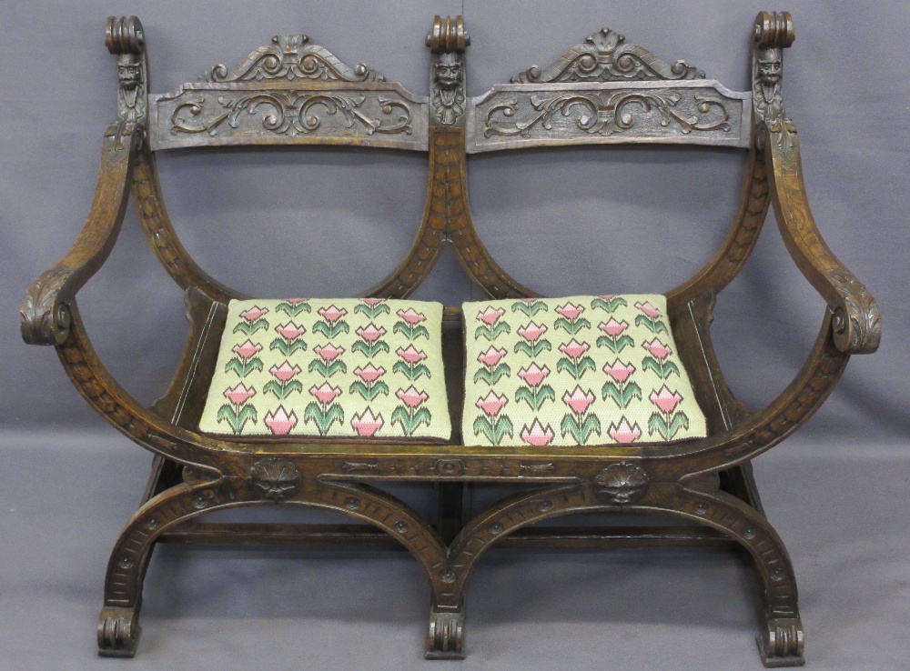 CONTINENTAL STYLE CARVED OAK DOUBLE BENCH with barrel type seat, the twin carved crest rail with