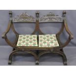 CONTINENTAL STYLE CARVED OAK DOUBLE BENCH with barrel type seat, the twin carved crest rail with