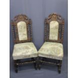 GRIFFIN CREST RAIL OAK BARLEY TWIST CARVED SIDE CHAIRS, a pair with upholstered padded backs and