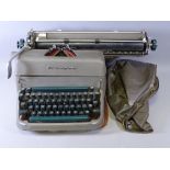 REMINGTON VINTAGE TYPEWRITER WITH COVER and accessories