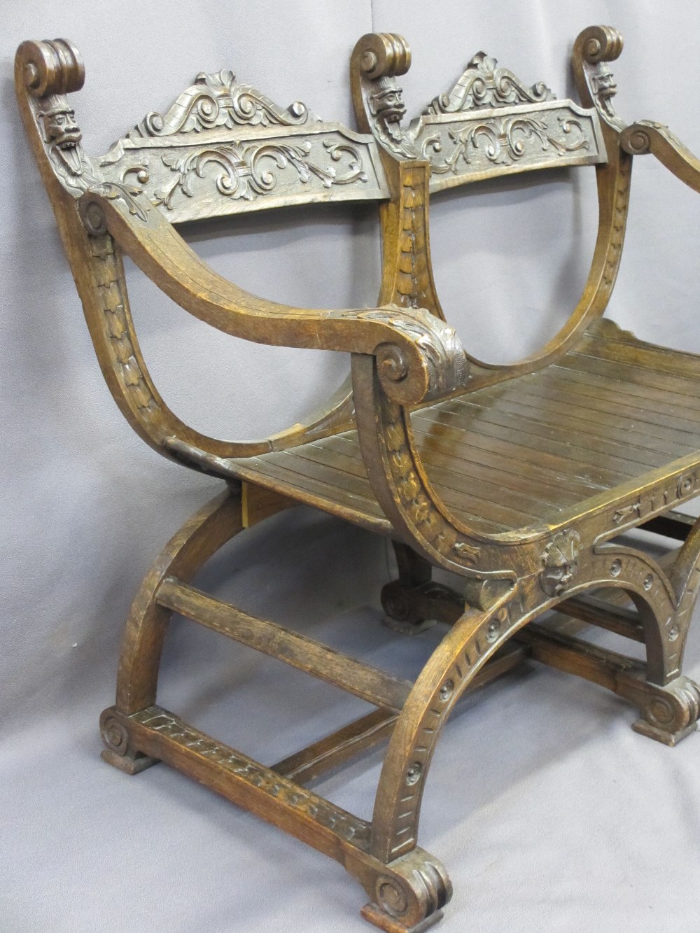 CONTINENTAL STYLE CARVED OAK DOUBLE BENCH with barrel type seat, the twin carved crest rail with - Image 3 of 3