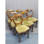 VICTORIAN MAHOGANY BALLOON BACK DINING CHAIRS, A SET OF SIX with shaped detail to the top rail and