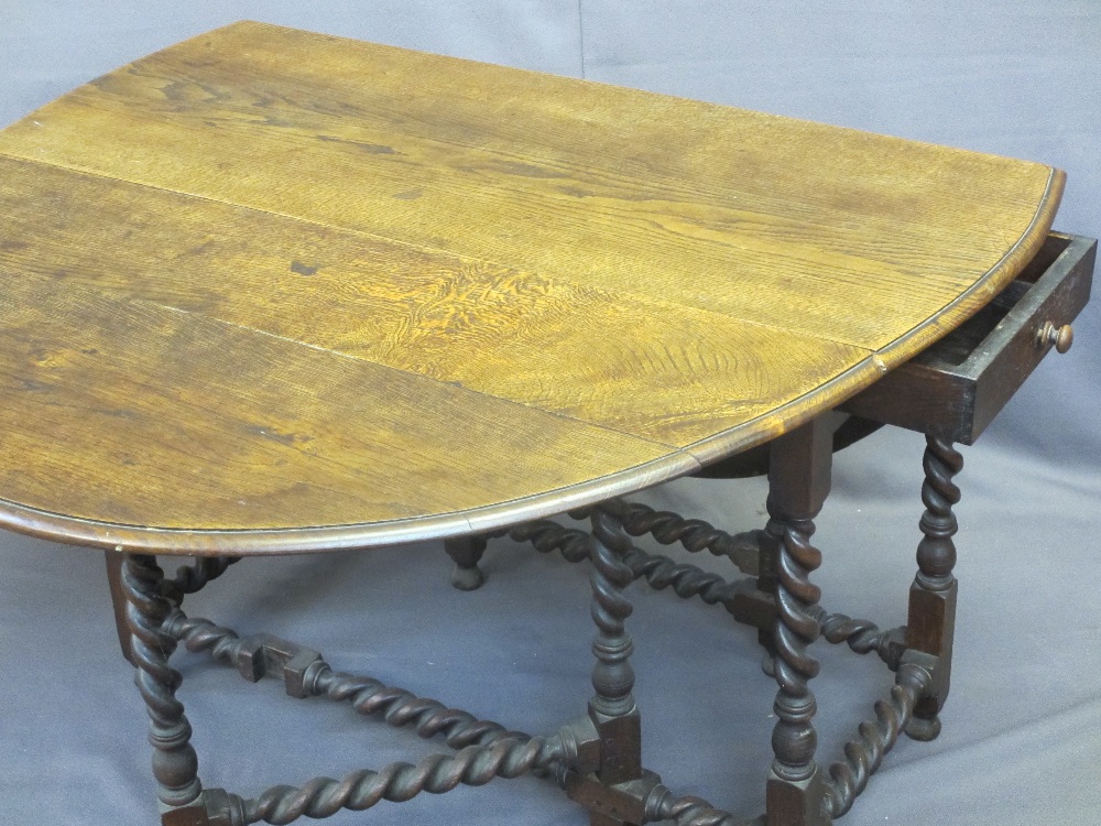 EARLY OAK BARLEY TWIST GATE-LEG DINING TABLE, twin-flap with single end drawer on barley twist