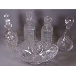 GLASSWARE to include heavy oval bowl and four decanters with stoppers