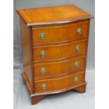 YEW WOOD SERPENTINE FRONT FOUR DRAWER CHEST, 70cms H, 51cms W, 37.5cms D