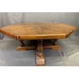 REPRODUCTION ANTIQUE PINE STYLE COFFEE TABLE, octagonal segmented type top on turned supports with