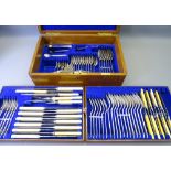 OAK CASED PART CANTEEN OF CUTLERY, mainly Walker & Hall, with others, two lift out trays and