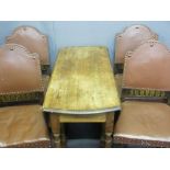 OAK DROP LEAF TABLE on turned supports with four rexine and studded dining chairs