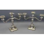 EPNS - a pair of three branch candle holders, 26cms tall