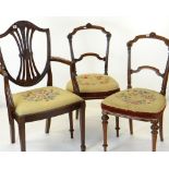 PAIR OF VICTORIAN WALNUT SALON CHAIRS with needlepoint stuff over seats and a George III-style