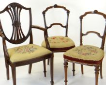 PAIR OF VICTORIAN WALNUT SALON CHAIRS with needlepoint stuff over seats and a George III-style