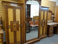 GOOD LATE VICTORIAN 'AESTHETIC' STYLE BEDROOM SUITE, floral carved panelled cupboards with brass