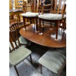 G-PLAN MAHOGANY EXTENDING OVAL DINING TABLE & EIGHT DINING CHAIRS, all with red G-Plan labels,
