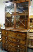 REGENCY MAHOGANY SECRETAIRE BOOKCASE, cavetto cornice above astragal glazed doors enclosing