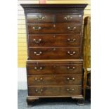 GEORGE III MAHOGANY TALLBOY CHEST, dentil cornice with blind fret frieze and canted corners,