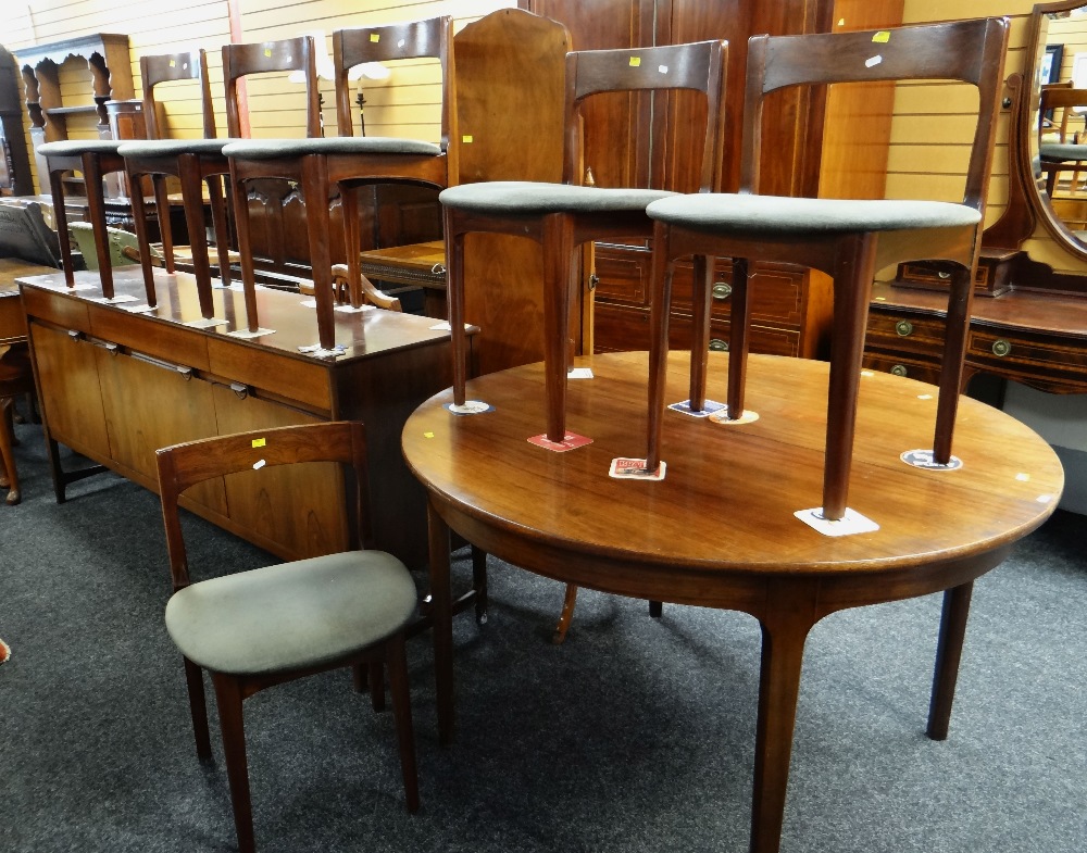 MID-CENTURY DANISH STYLE ROSEWOOD DINING SUITE comprising oval extending dining table, six chairs