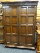 WARING & GILLOW 17TH CENTURY-STYLE PANELLED OAK WARDROBE, fitted interior, 138cms wide