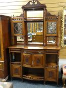 LATE VICTORIAN WALNUT PARLOUR CABINET with glazed and mirrored superstructure, above bow front base,